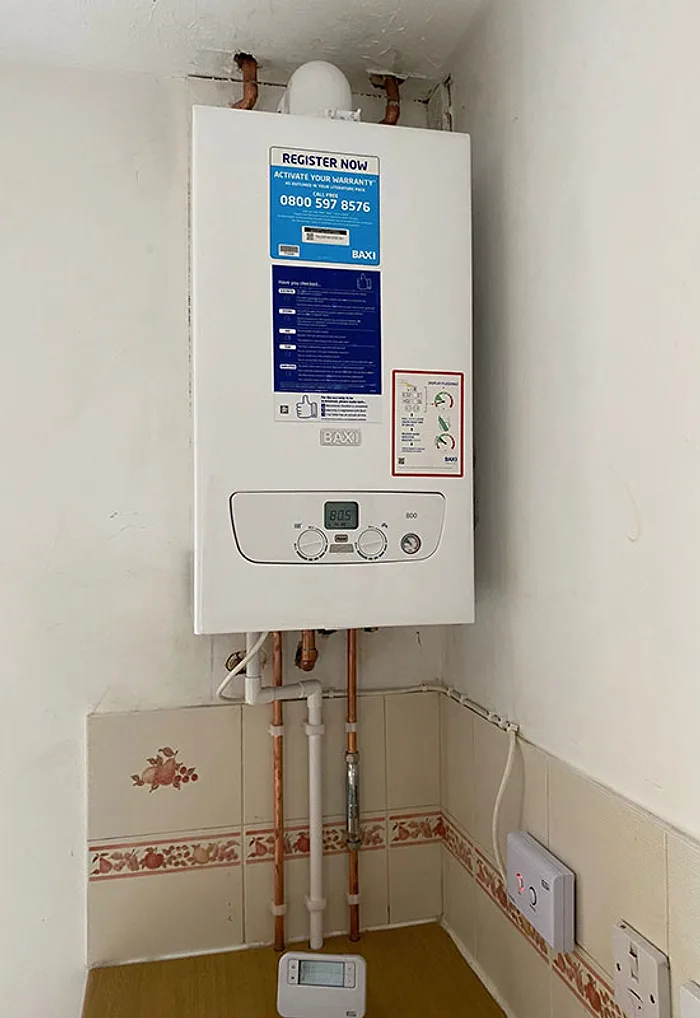 A new boiler neatly installed by LongLife in a kitchen corner